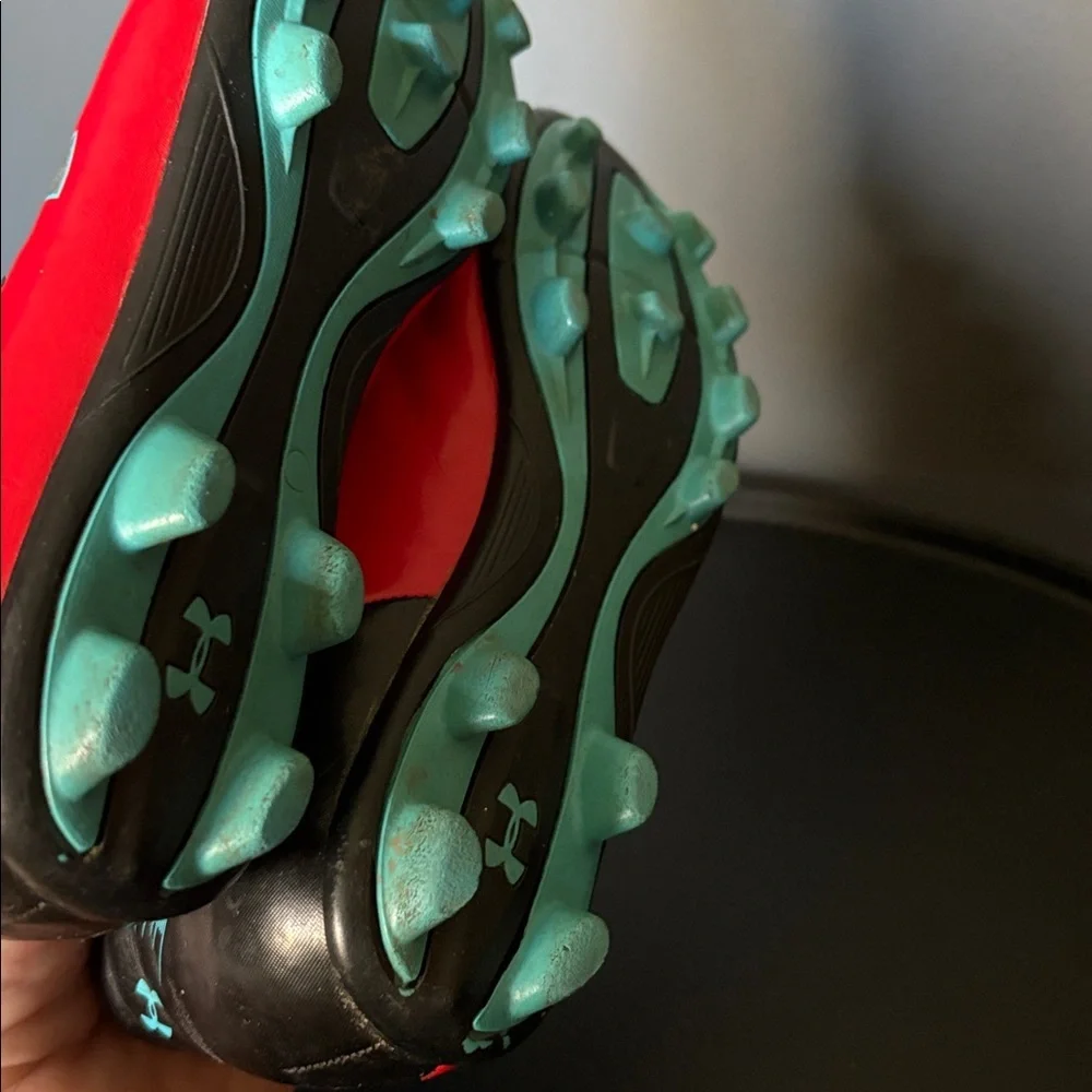 Under Armour size 1 Red and Teal Soccer Cleats